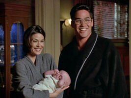 An adopted baby in the Lois & Clark episode "The Family Hour" (1997)