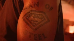 John Henry's "Man of Steel" tattoo