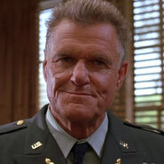 Charles Napier as Col. David