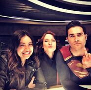 Hoechlin photographed with castmates Floriana Lima and Chyler Leigh. This photo resulted in controversy as a Superman actor has never knowingly been photographed doing such a crude gesture in-costume.[1]