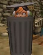 Meggy in a trash can