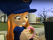 Meggy as a police officer...Donut time!