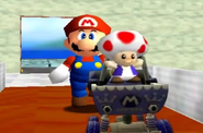 Mario and Toad with the Goo Goo Buggy.