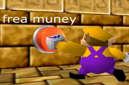 Wario pressing a button that says "frea muney".