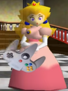 Peach playing the N64 in Super Mario 64 Bloopers: Who let the chomp out?