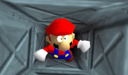 Mario falling through the Castle's air vent system.