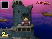 Peach si dirige alla fortezza in volo