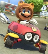 Mario Tanuki in Mario Kart 8 a bordo del Coccinello Volante