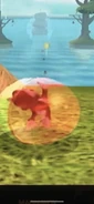 Screenshot of AiAi reaching up with his right arm