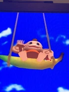 Screenshot of AiAi waving as the swing rises