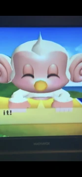 Baby lying on his stomach on the swing