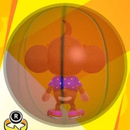 AiAi wearing G sunglasses, a blue polka dot shirt, pink low-cut high-tech sneakers, and in a basketball ball (back view)