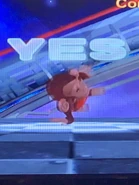 Screenshot of GonGon rotating on his right hand while lifting up his right fist