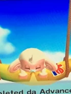 Screesnhot of Baby lying on his stomach on the swing