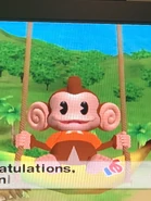 Screenshot of AiAi sitting on the swing