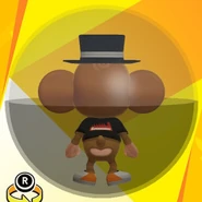 AiAi wearing a black silk hat, a black SMB BOX logo shirt, white low-cut low-tech sneakers, and in a black ball (back view)