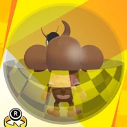 AiAi wearing a hannya mask, a pink banana shirt, and in a checker pattern ball (back view)