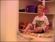 Billy playing with blocks.