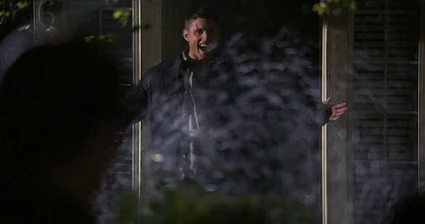 Dean celebrates holy water.