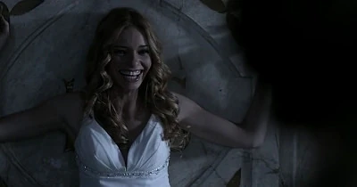 Lilith laughs at Sam when he hesitates upon hearing Dean's voice.