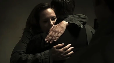 Ellen is relieved to see Dean and Sam.