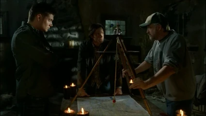 Bobby finds Lilith's exact location with a tracking spell.