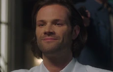 Dean walking up to Sam with the Colt, aiming it at the back of his head