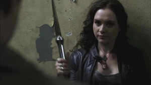 Meg prepares to fight Crowley's hellhounds with Cass's Angel Blade