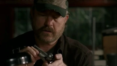 Bobby tries to figure out what makes the Colt "tick."