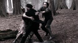 Benny fights off the vampires