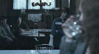 Cole, Sam and Dean watch Cole's grieving mother.