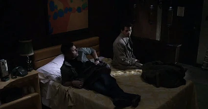 Dean wakes up very annoyed to find Castiel in the room.