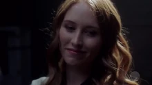 Jessica smiling after sending ghosts to the next plane of existence.