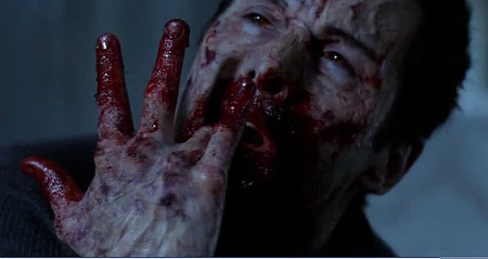 Jack samples unconscious Dean's blood as Sam pleads with him from the locked closet to stop.