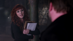 Rowena holding Supernatural Brother's Keeper
