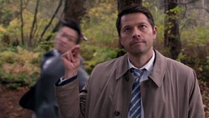 An angel attempts to strikes Lucifer with an angel blade