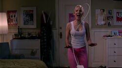 A laptop plug hovers in the air arounds the girl Julia and strangles her to death