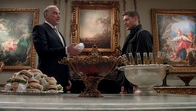 Zachariah offers Dean burgers, beer and babes to try and pacify him until he's needed.