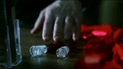 Gabriel attempting to steal the vials of blood.