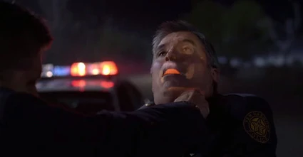 Dean sees the true visage of the policeman and responds accordingly.