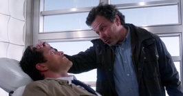 Supernatural-s8-ep23-Metatron-standing-over-Castiel-in-a-chair.png