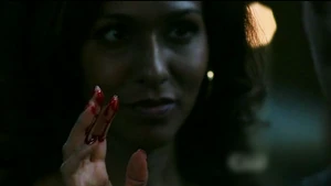 Kali casting a blood spell on Gabriel.