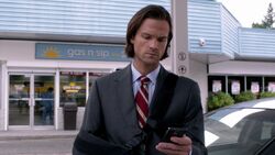 Sam finds a text on Neely's phone that had alerted the demon to Dean's presence