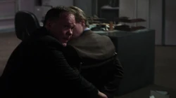 One of Thule Hangar Guards rushes toward Christoph and untied him