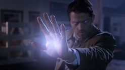 Castiel using his white light on Cain.