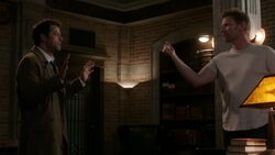 Nick snaps his fingers at Castiel