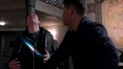 Dean slashes Gadreel across the chest with the First Blade