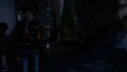 Sonja binds Sam to a chair