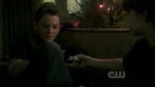 Sam gives Dean amulet2