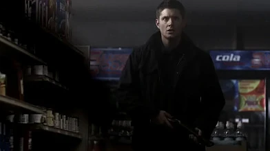 Dean is stunned by the sight of Sam standing over slain demons.